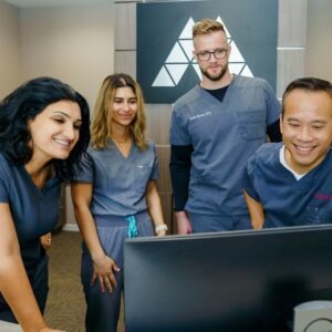 dentists looking at a computer screen