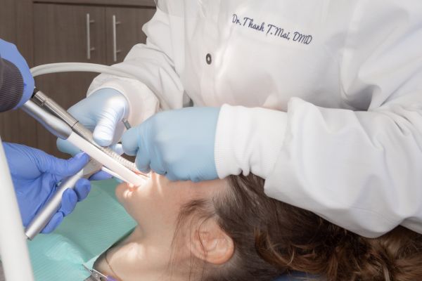 cleaning girls teeth