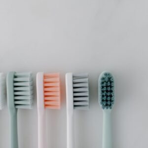 toothbrushes lined up on counter