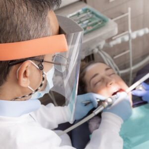 a dental implant procedure with an oral surgeon 