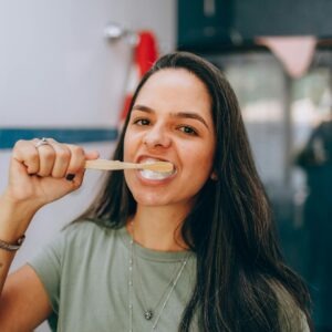 Woman brushing her teeth